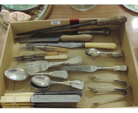A selection of vintage cutlery and table wares 