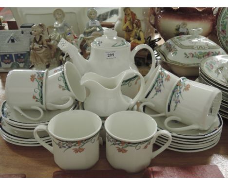 A part tea service by Royal Doulton in the Juno pattern 21 pieces approx