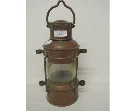 A vintage copper and brass ships style light with name badge reading Anchor