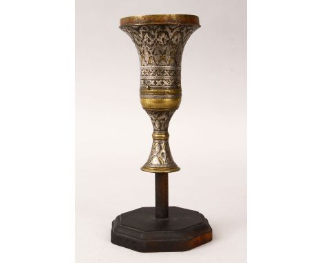 18TH / 19TH CENTURY SILVER INLAID ISLAMIC PERSIAN QAJAR ZAND HUQQA TOP, mounted on a wooden base, 20cm high x 7.5cm wide.