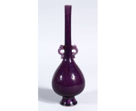 A GOOD CHINESE KANGXI PERIOD AUBERGINE GROUND PORCELAIN VASE, the vase with twin chilong handles, 16cm high.