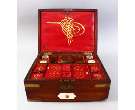 A GOOD ISLAMIC TURKISH BOXED BRASS BOUND CALLIGRAPHY SET WITH INLAID GOLD TOOLS, the brass bound box opening to reveal many s