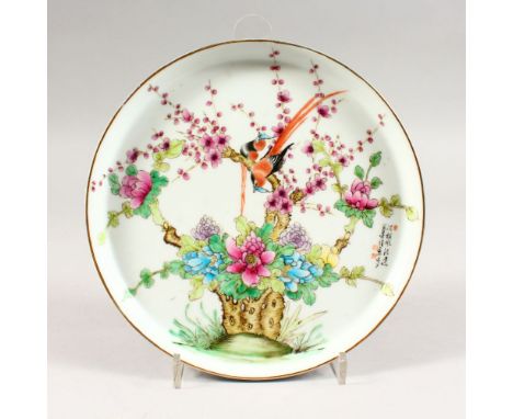 A GOOD CHINESE REPUBLIC FAMILLE ROSE PORCELAIN DISH, decorated with scenes of birds amongst native flora, the left section wi