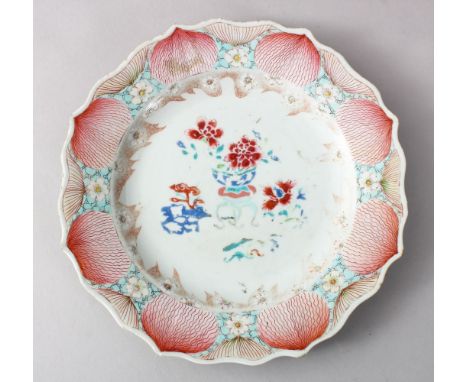 A GOOD CHINESE 18TH CENTURY FAMILLE ROSE PORCELAIN LOBED PLATE, the dish with panel enamel decoration in floral style with a 