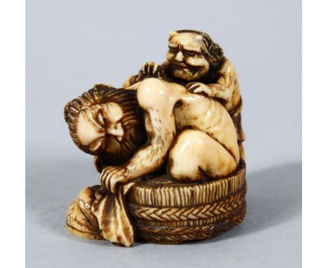 A GOOD JAPANESE MEIJI PERIOD CARVED IVORY NETSUKE OF SHOKI &amp; ONI, shoki rendered leant over a weaved basket with oni tryi