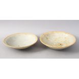 A GOOD PAIR OF EARLY CHINESE POTTERY BOWLS, 14.5cm diameter.