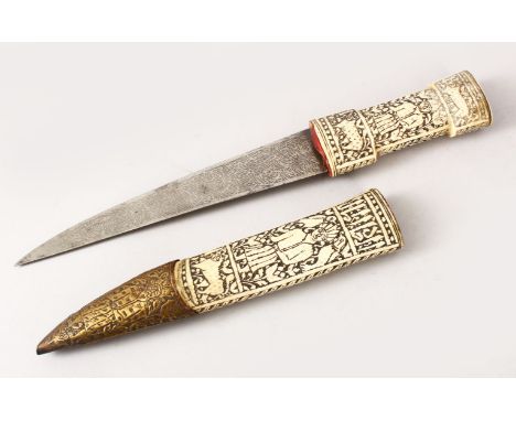 AN EARLY PERSIAN QAJAR HAND CARVED BONE / IVORY DAGGER, with carved decoration of figures and animals, with a panel of callig