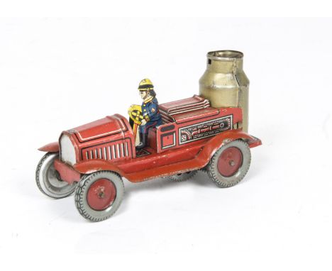German post-war US Zone Tinplate Clockwork Fire Engine, in red  with spark effect boiler and one Fireman, G, lacks front gril