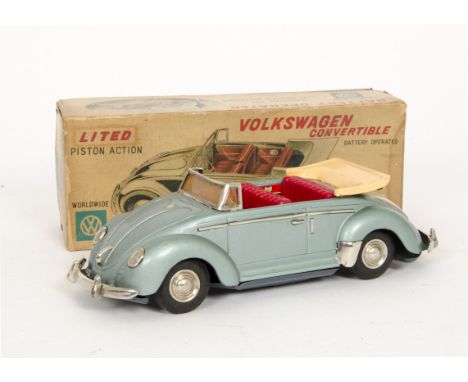 A Nomura (T.N) Japan Tinplate Volkswagen Convertible, battery-operated model, light metallic blue tinplate body, red plastic 