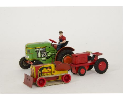 Tipp &amp; Co Tinplate Clockwork Tractor,  green body, red hubs, driver, 'TCO-65' registration, Wells Brimtoy Pocketoy tinpla