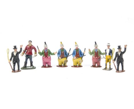 Hollow cast lead Circus figures consisting of ringmasters by Britains and Benbros (2),  Timpo clowns playing stringed instrum