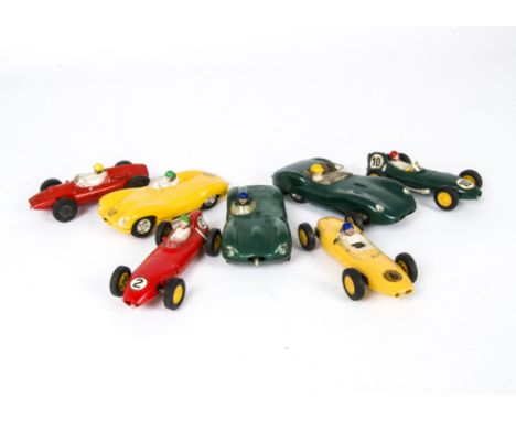 1960s Tri-ang Scalextric Slot Cars, C56 Lister Jaguar (big head), dark green body, C60 Jaguar D-Type, yellow body, another in