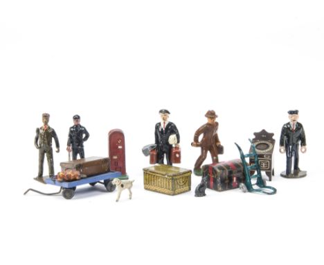 Railway station figures and accessories by Britains, Timpo, Hilco, Crescent and Hornby, including Britains Porter with golf s