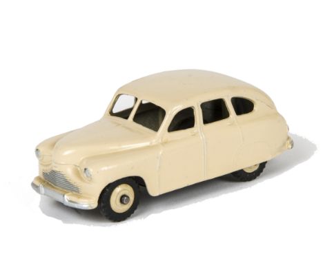 A Dinky Toys 153 Standard Vanguard, 3rd casting, cream body and hubs, M tyres, VG, minor retouches 