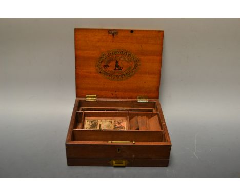 A late 19th century mahogany artist's box, by Reeves & Sons, 113 Cheapside, London, with ceramic mixing palette, 21.5cm wide