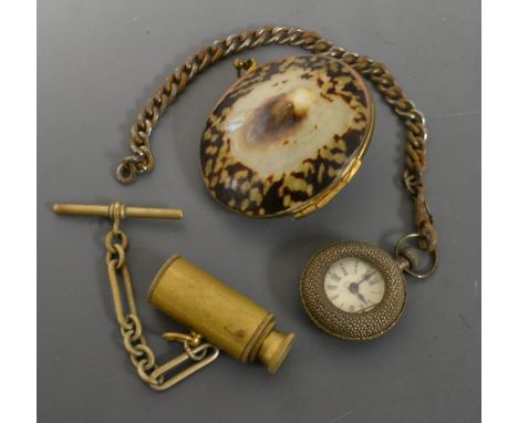 A Victorian childs toy watch; a shell snuff box; a miniature telescope