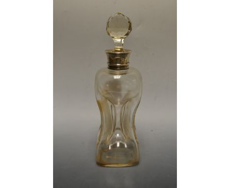 An Edwardian silver and glass waisted dimple decanter and stopper, Birmingham 1907