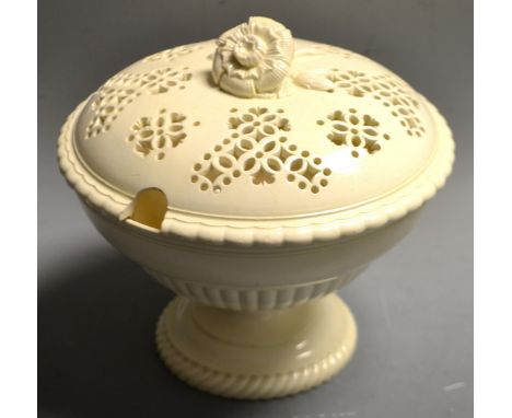 A Leeds creamware urnular pedestal sauce tureen and cover, pierced fretwork cover with flower and sprig finial, the tureen wi