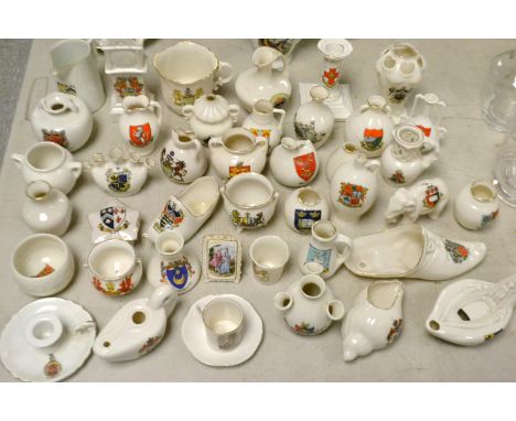 Crested China - a W H Goss model of an Ancient Egyptian Lamp found at Bournemouth, matching crest; a Willow Art elephant; a R