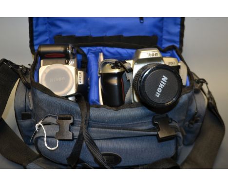 Photography - A Nikon F60 35mm SLR camera with a Nikkor 28 -80 f3.5 zoom lens; a Nikon F65 35 SLR camera body; Jessops carryi