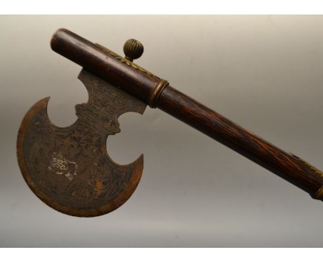 A reproduction Middle Eastern throwing axe, engraved blade, hardwood shaft

