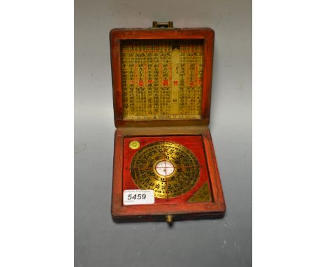 A Chinese compass in lacquer case with gilt dragons