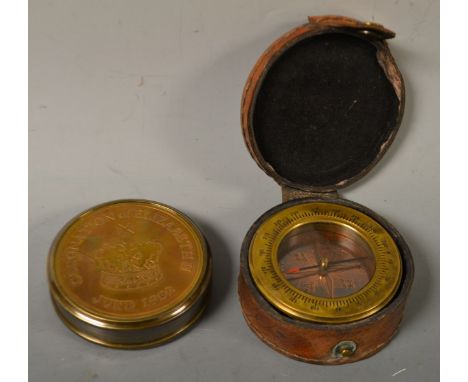 A novelty reproduction Mary Rose brass compass; a coronation souvenir compass 1952 - 2005 (2)