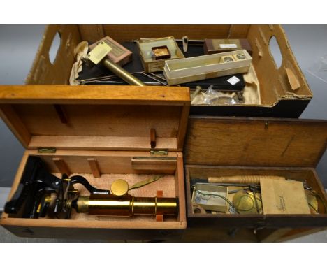A mid 20th century microscope with moulded mark, boxed; a Household Improved microscope No 2, associated slides; other apothe