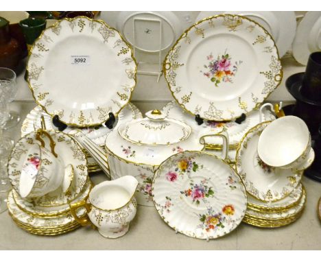 A Royal Crown Derby posie pattern part dinner service, comprising dinner plates, side plates, tea pot, bread and butter plate