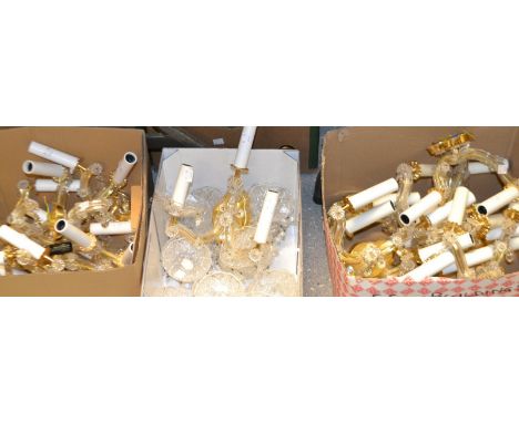 Fifteen three light cut glass and gilt metal wall sconces.