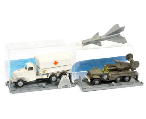 FJ Military a pair (1) Rocket Firing Lorry - drab green with silver-grey rocket (2) Covered Lorry "Ambulance" - white body wi