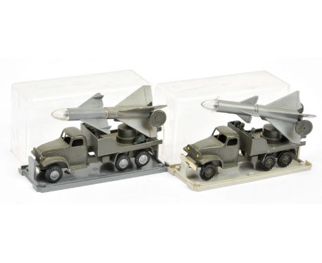 FJ Military a pair of Rocket Firing Lorries (1) drab green with silver hubs and silver-grey rocket and (2) same but drab gree
