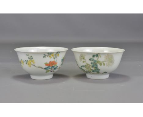 A very fine pair of Chinese Qing dynasty tea cups painted inside and out with branches of flowers. Possibly Yongzheng. Six ch