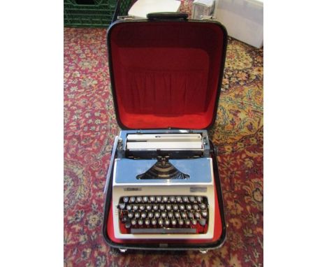 Vintage Erika typewriter in case&nbsp;