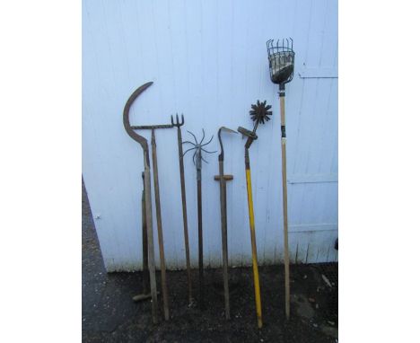 Mixed garden tools including fruit picker and sickle etc