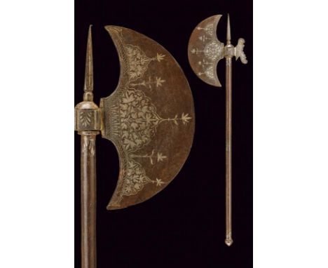 dating: Late 19th Century provenance: Indopersia, Convex-edged axe richly inlaid with silver rinceaux and leaves on both face