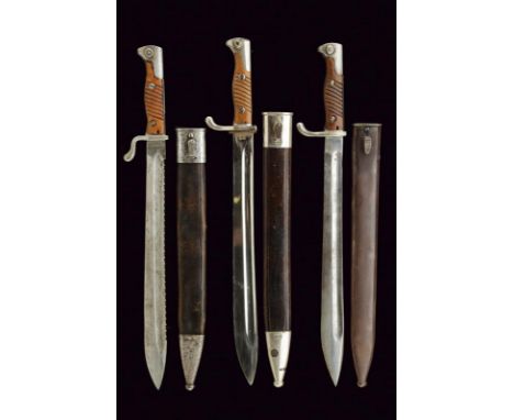 dating: 1914-18 provenance: Germany, One 98/05 bayonet by W.K & C, Solingen, with wooden grip and nickel-plated mounts (Ausge