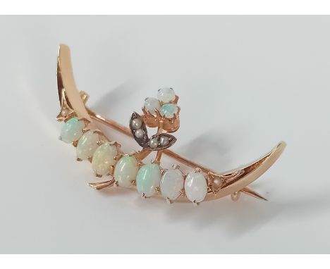 A 14ct gold opal and seed pearl crescent brooch, approx 3.49g.