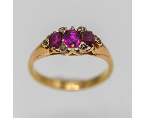 A Burma ruby and diamond set ring, in 18ct yellow gold, size K/L.