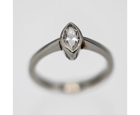A platinum oval shaped diamond single stone ring, size J/K.