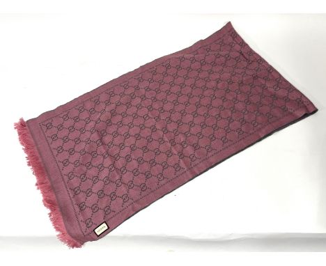 Gucci, a pink GG logo wool scarf, with label tag, original receipt purchased 2020 for £230.00 (label tag has been removed fro