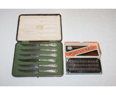 A cased set of six Mappin & Webb silver handled dessert knives, Sheffield 1936 and a boxed Rolls razor 