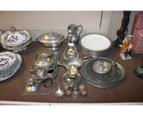 A large quantity of various pewter to include Scottish examples, dinner plates, serving trays, sauce boat, side plates, inkwe