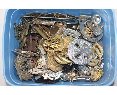 A box of military hat badges