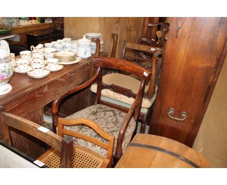 A Victorian mahogany carver chair; a Victorian upholstered stool raised on cabriole supports; a Victorian kidney back dining 