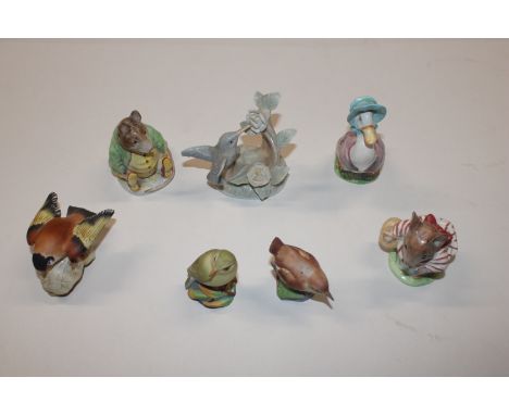 A collection of Beswick Beatrix Potter ornaments to include Jemima Puddleduck, Samuel Whiskers and Mrs Tittlemouse; a John Je