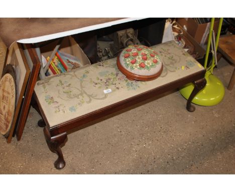 A needlework duet stool raised on cabriole supports and  footstool decorated with strawberries 