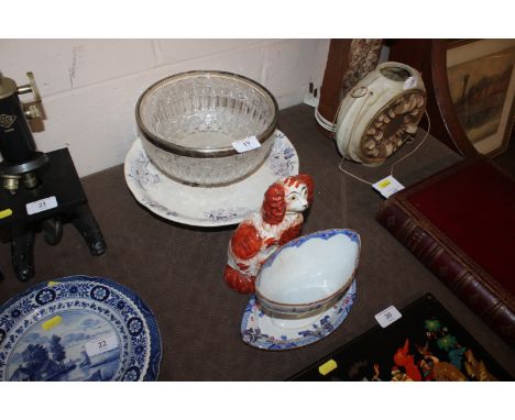 A 19th Century pedestal sauce tureen decorated in the Oriental manner; a Victorian pottery comport with floral decoration; a 