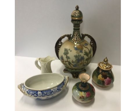 A collection of Royal Worcester comprising a squat vase with floral decoration on a green and yellow ground, No'd. F110-H31C4