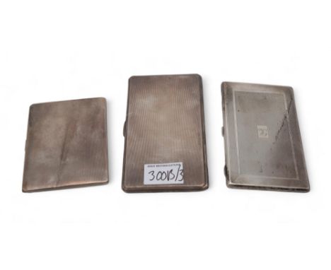 A silver cigarette case, by John Rose, Birmingham, and two others, all with engine-turned decoration, 594gms Condition Report
